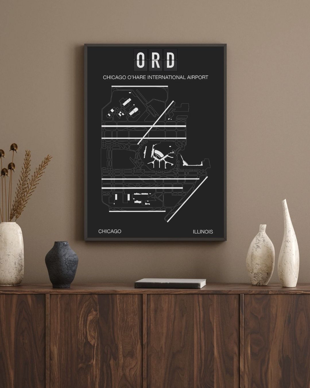 Chicago O’Hare airport print displayed on a wood credenza